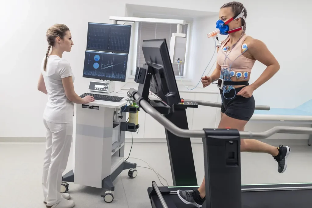 young woman getting tested by EKG tech